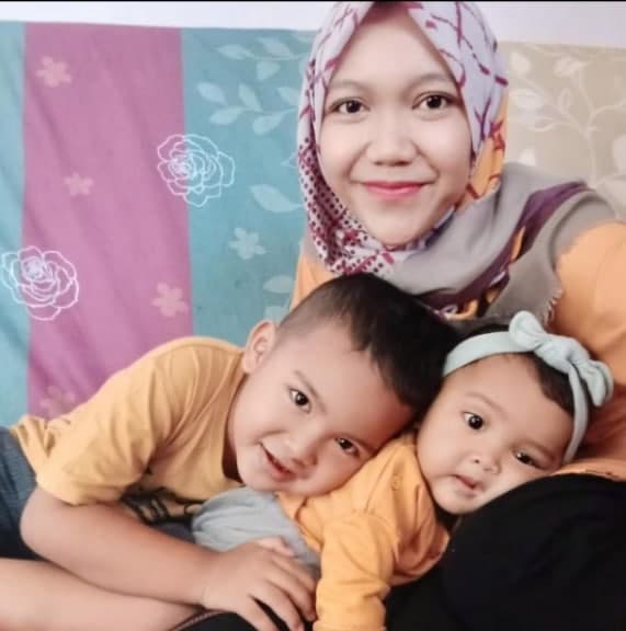 	 Tri Andini